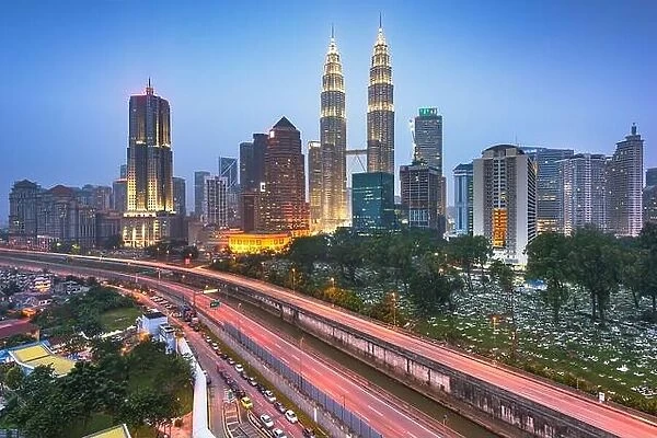Kuala Lumpur, Malaysia highways and skyline at night