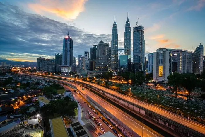 Framed Print : Kuala Lumpur skyline and skyscraper with highway road at night in Kuala Lumpur, Malaysia. Asia Framed Print : Kuala Lumpur skyline and skyscraper with highway road at night in Kuala Lumpur, Malaysia. Asia