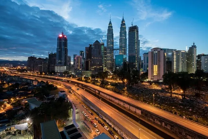 Framed Print : Kuala Lumpur skyline and skyscraper with highway road at night in Kuala Lumpur, Malaysia. Asia Framed Print : Kuala Lumpur skyline and skyscraper with highway road at night in Kuala Lumpur, Malaysia. Asia