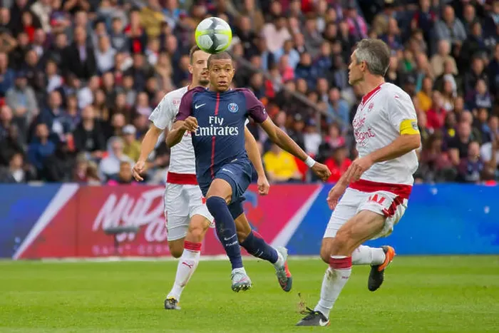 Framed Print : Kylian Mbappe in action during the French Ligue 1 soccer match between Paris saint Germain (Ps G) Framed Print : Kylian Mbappe in action during the French Ligue 1 soccer match between Paris saint Germain (Ps G)