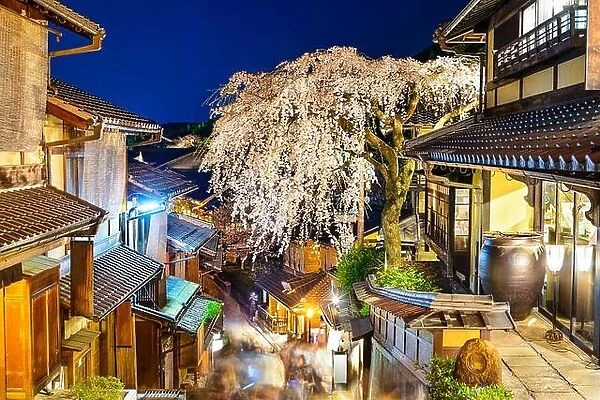 Kyoto, Japan alleyway scene in the Higashiyama district at night during the spring season