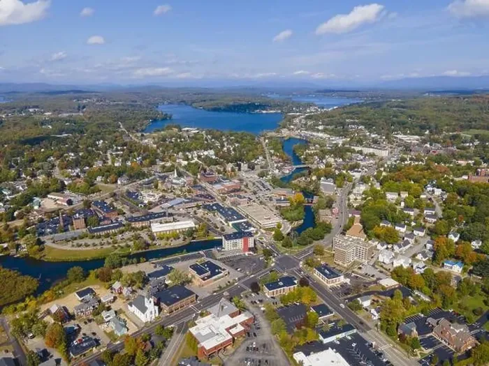 Framed Print : Laconia city center and Opechee Bay of Lake Winnipesaukee aerial view with fall foliage in downtown Laconia Framed Print : Laconia city center and Opechee Bay of Lake Winnipesaukee aerial view with fall foliage in downtown Laconia