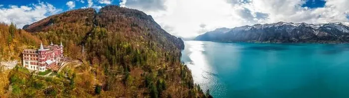 Framed Print : Lake Brienz and Giessbach Waterfall by Interlaken with the Swiss Alps covered by snow, Switzerland Framed Print : Lake Brienz and Giessbach Waterfall by Interlaken with the Swiss Alps covered by snow, Switzerland