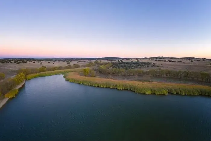 Framed Print : Lake drone aerial view at sunset in Alentejo, Portugal Framed Print : Lake drone aerial view at sunset in Alentejo, Portugal