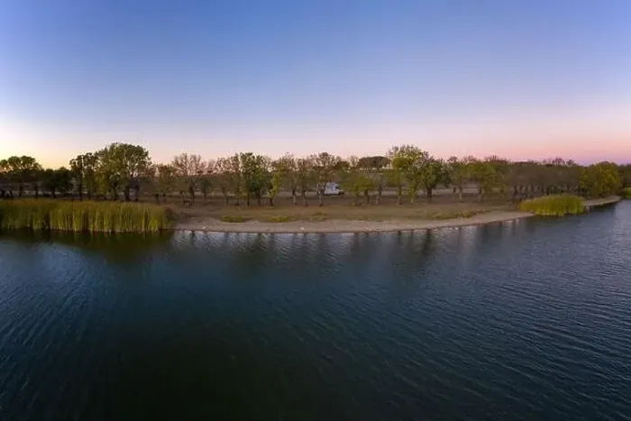Framed Print : Lake drone aerial view at sunset in Alentejo, Portugal Framed Print : Lake drone aerial view at sunset in Alentejo, Portugal