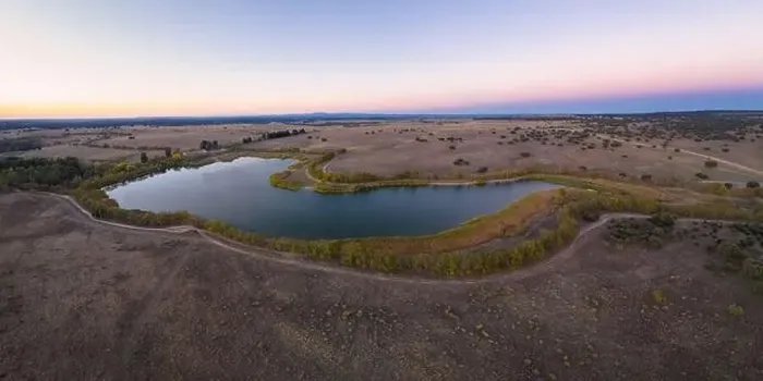 Framed Print : Lake drone aerial view at sunset in Alentejo, Portugal Framed Print : Lake drone aerial view at sunset in Alentejo, Portugal