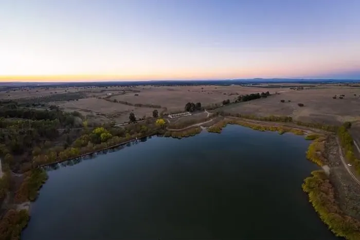 Framed Print : Lake drone aerial view at sunset in Alentejo, Portugal Framed Print : Lake drone aerial view at sunset in Alentejo, Portugal