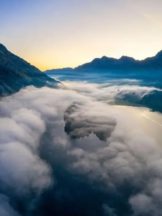 Framed Print : Lake Silvaplana and Sils hidden by the autumnal fog at dawn Framed Print : Lake Silvaplana and Sils hidden by the autumnal fog at dawn
