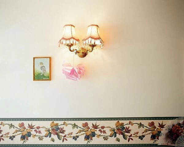 Lamp and painting on wall