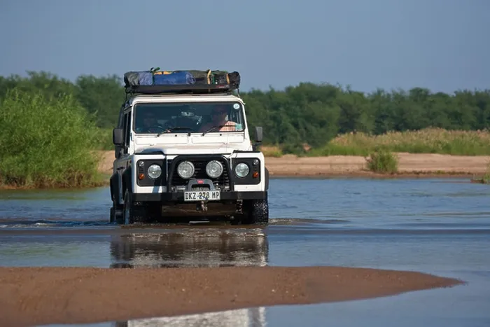 Framed Print : Landrover crossing the Limpopo river at Pafuri Framed Print : Landrover crossing the Limpopo river at Pafuri