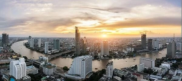 Landscape of Chao phraya river in Bangkok city in evening time with bird view. Bangkok City at night time, Hotel and resident area in the capital of T