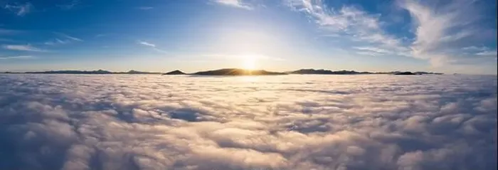 Framed Print : Landscape above the clouds with mountain peaks at sunrise. Dramatic cloudscape from aerial view Framed Print : Landscape above the clouds with mountain peaks at sunrise. Dramatic cloudscape from aerial view