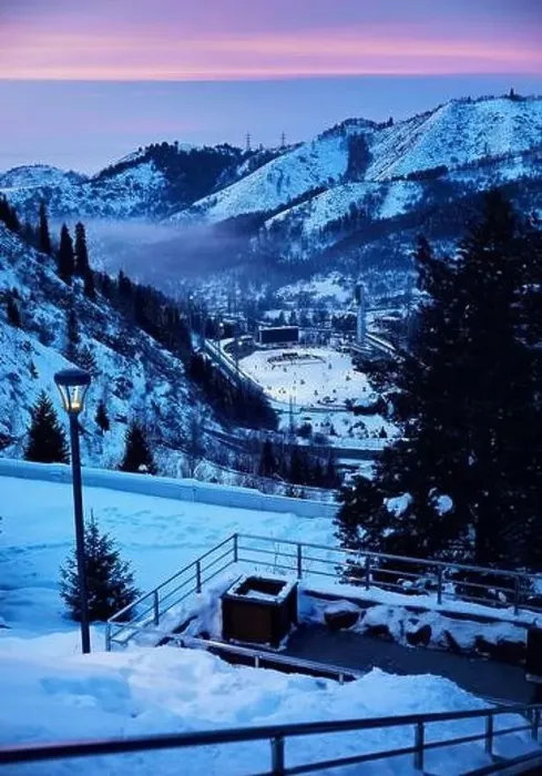 Framed Print : Landscape of glowing Medeu skating rink from top view of stairs health in Tian Shan mountains at pink sunset in Almaty