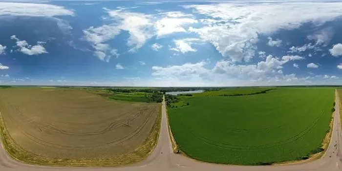 Framed Print : Landscape of green and brown field. Farmland and road. Beautiful blue sky with big clouds Framed Print : Landscape of green and brown field. Farmland and road. Beautiful blue sky with big clouds