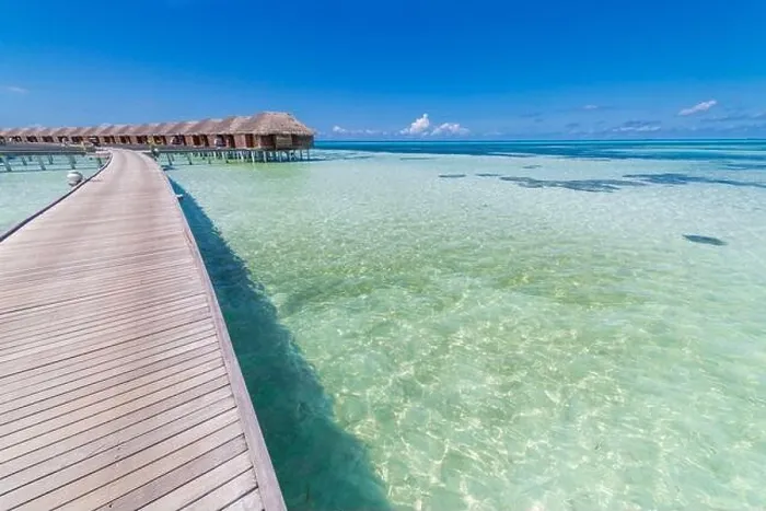 Framed Print : landscape of Maldives beach. Tropical panorama, luxury water villa resort with wooden pier jetty. Luxury travel destination background summer vacation Framed Print : landscape of Maldives beach. Tropical panorama, luxury water villa resort with wooden pier jetty. Luxury travel destination background summer vacation