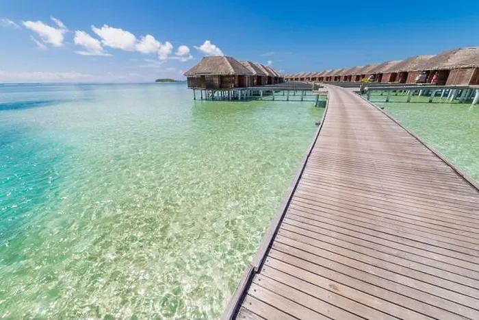 Framed Print : landscape of Maldives beach. Tropical panorama, luxury water villa resort with wooden pier jetty. Luxury travel destination background summer vacation Framed Print : landscape of Maldives beach. Tropical panorama, luxury water villa resort with wooden pier jetty. Luxury travel destination background summer vacation