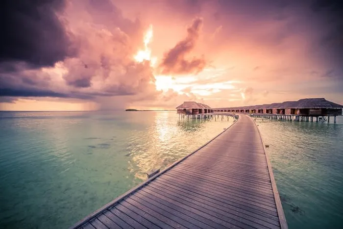 Framed Print : landscape of Maldives beach. Tropical panorama, luxury water villa resort with wooden pier or jetty. Luxury summer travel destination vacation