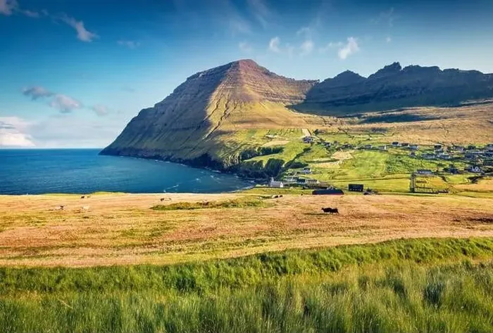 Framed Print : Landscape photography. Sunny summer view from flying drone of Vidareidi village