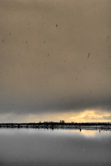 Framed Print : landscape picture of silhouetted city buildings in bleak miserable winter weather Framed Print : landscape picture of silhouetted city buildings in bleak miserable winter weather