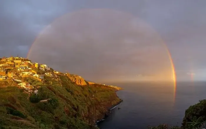 Framed Print : Landscape with rainbow over Canico at sunset time in Madeira Framed Print : Landscape with rainbow over Canico at sunset time in Madeira