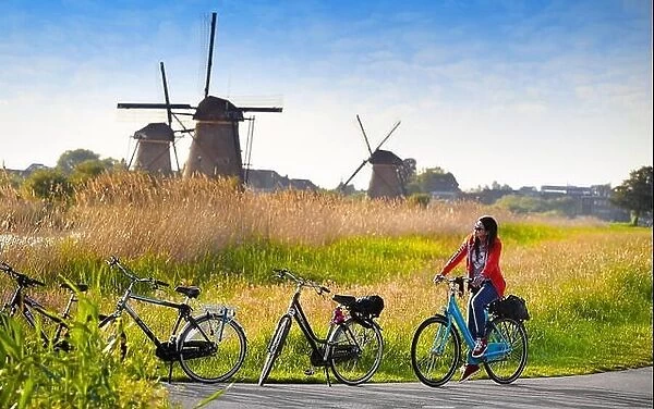 Landscape view with windmills and bicycles - Kinderdijk, Holland Netherlands