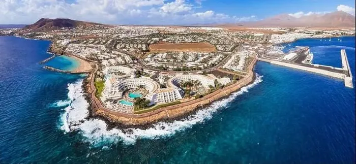 Framed Print : Lanzarote island, Playa Blanca resort. aerial drone panoramic view. Canary islands of Spain Framed Print : Lanzarote island, Playa Blanca resort. aerial drone panoramic view. Canary islands of Spain