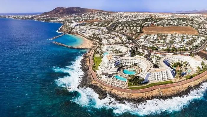 Framed Print : Lanzarote island, Playa Blanca resort. aerial drone panoramic view. Canary islands of Spain Framed Print : Lanzarote island, Playa Blanca resort. aerial drone panoramic view. Canary islands of Spain