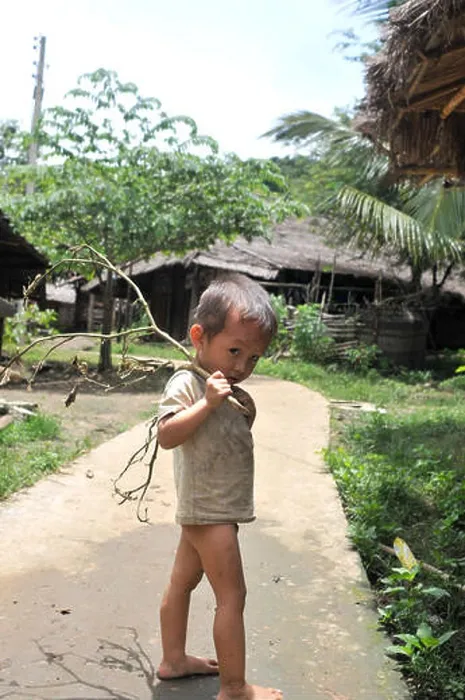 Framed Print : A Lao boy in Luang Prabang in Laos Framed Print : A Lao boy in Luang Prabang in Laos