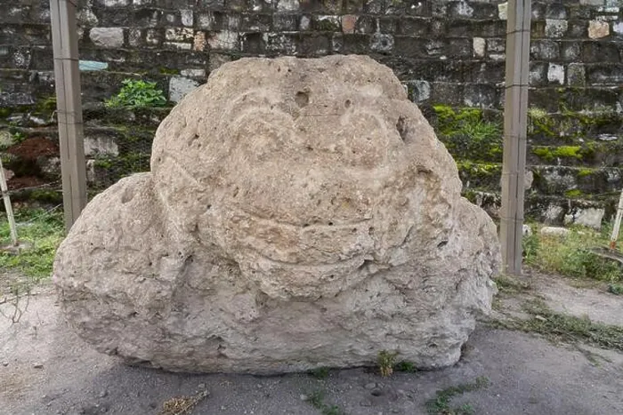 Framed Print : A large carved stone sculpture of a frog Framed Print : A large carved stone sculpture of a frog