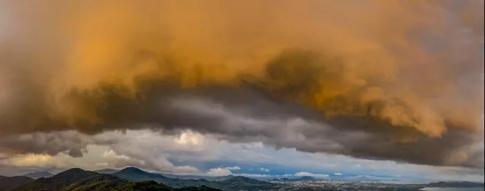 Framed Print : A large cloud and thunderstorm covers Phuket island in sunset time Framed Print : A large cloud and thunderstorm covers Phuket island in sunset time