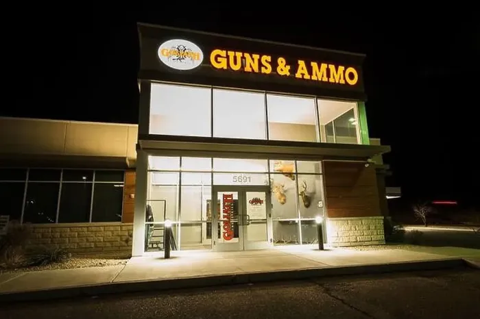 Framed Print : A large gun shop at night at a mall in Lake Havasu City, Arizona, USA Framed Print : A large gun shop at night at a mall in Lake Havasu City, Arizona, USA