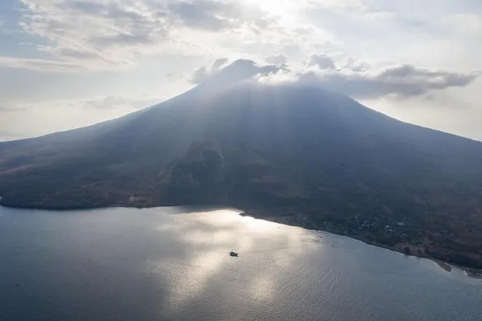 Framed Print : Late afternoon sunlight illuminates the Iliape volcano found just east of Flores, Indonesia. This tropical area is part of the famous Ring of Fire