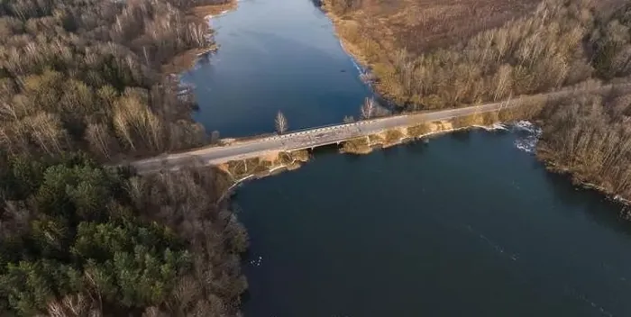 Framed Print : Late fall. Bridge over the river. Shot on a drone Framed Print : Late fall. Bridge over the river. Shot on a drone