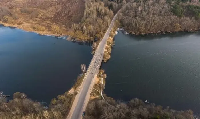 Framed Print : Late fall. Bridge over the river. Shot on a drone Framed Print : Late fall. Bridge over the river. Shot on a drone