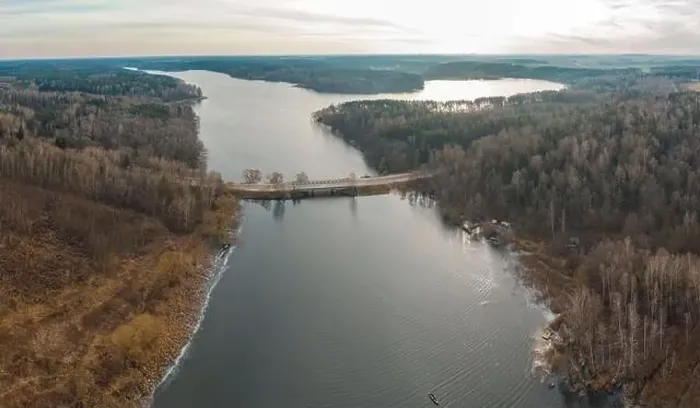 Framed Print : Late fall. Bridge over the river. Shot on a drone Framed Print : Late fall. Bridge over the river. Shot on a drone