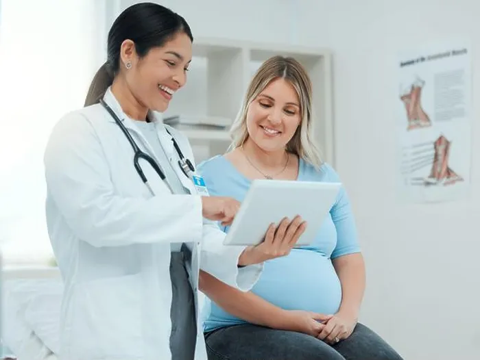 Framed Print : Lets check that precious heartbeat and movements. a doctor during a consultation with a pregnant patient in a clinic Framed Print : Lets check that precious heartbeat and movements. a doctor during a consultation with a pregnant patient in a clinic