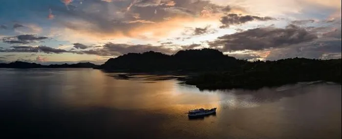 Framed Print : The last light of day illuminates clouds drifting above remote islands in the Solomon Islands. This country is home to high marine biodiversity Framed Print : The last light of day illuminates clouds drifting above remote islands in the Solomon Islands. This country is home to high marine biodiversity