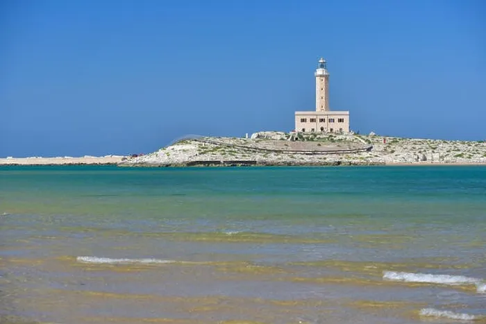 Framed Print : Lighthouse from the coast of Vieste on a sunny day, Puglia region, Italy Framed Print : Lighthouse from the coast of Vieste on a sunny day, Puglia region, Italy