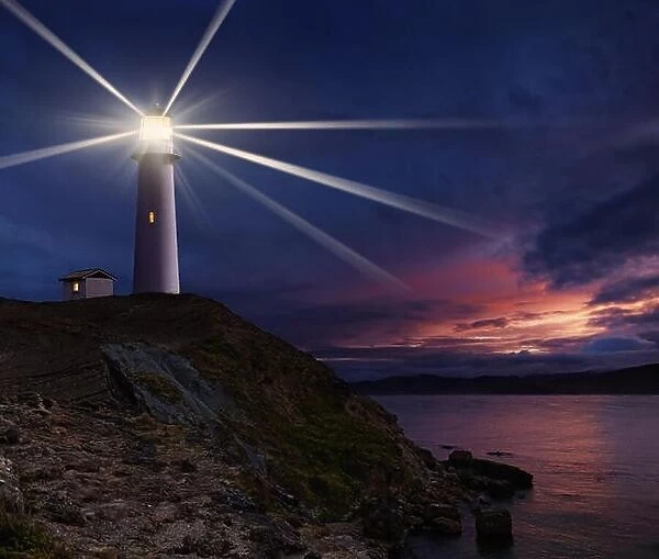 Lighthouse on the island against night sky