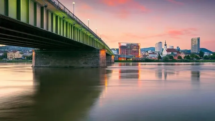 Framed Print : Linz, Austria. Cityscape image of riverside Linz, Austria at summer sunset with reflection of the city lights in Danube river Framed Print : Linz, Austria. Cityscape image of riverside Linz, Austria at summer sunset with reflection of the city lights in Danube river