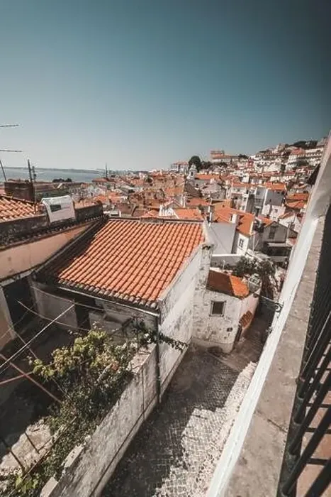 Framed Print : LISBON, PORTUGAL - MAY 7, 2018: view to town with orange roofs in Lisbon, Portugal Framed Print : LISBON, PORTUGAL - MAY 7, 2018: view to town with orange roofs in Lisbon, Portugal