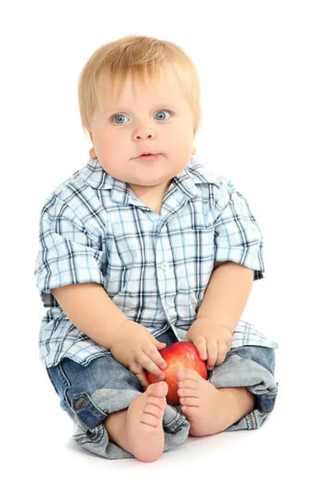 Framed Print : Little boy with red apple, isolated on white Framed Print : Little boy with red apple, isolated on white