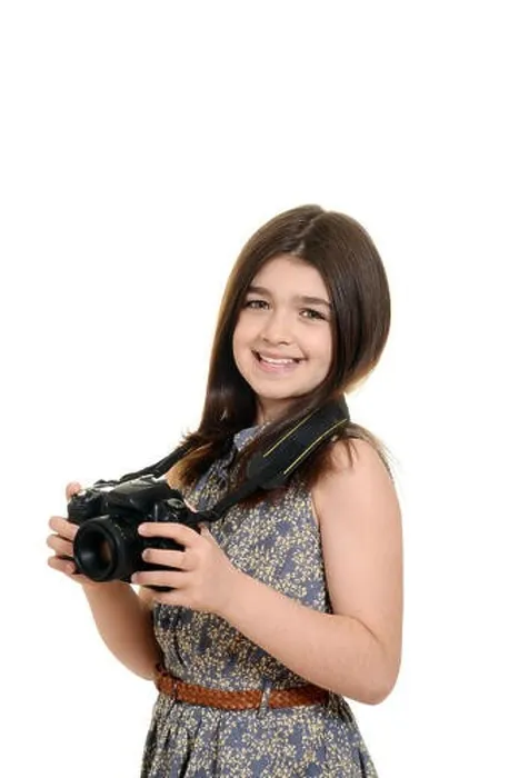 Framed Print : Little girl holding dslr camera Framed Print : Little girl holding dslr camera