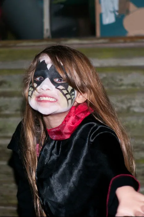 Framed Print : Little Girl Wearing Halloween Face Paint and Costume Pulling an Scary Face Framed Print : Little Girl Wearing Halloween Face Paint and Costume Pulling an Scary Face