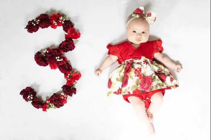 Framed Print : Little newborn baby girl in red dress. 3 month old baby Framed Print : Little newborn baby girl in red dress. 3 month old baby