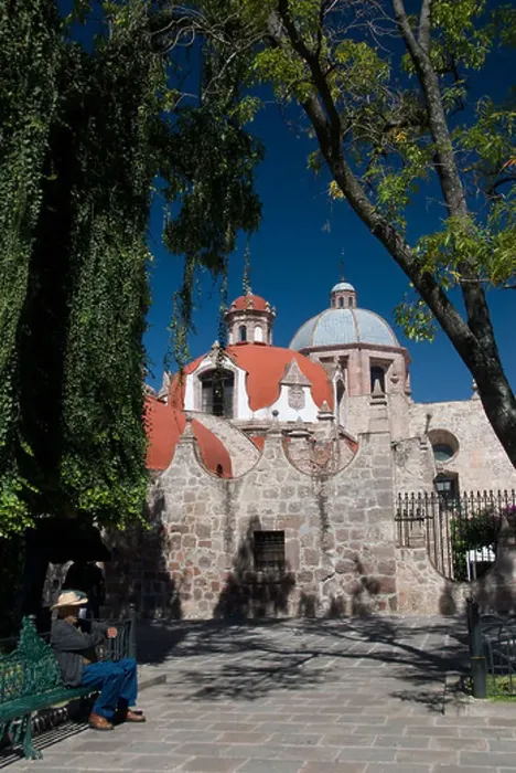 Framed Print : Local man resting on a park bench with Iglesia del Carmen in background, Morelia, Michoacan, Mexico, North America Framed Print : Local man resting on a park bench with Iglesia del Carmen in background, Morelia, Michoacan, Mexico, North America