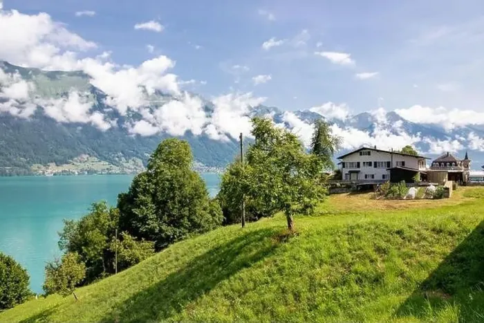 Framed Print : The local Swiss houses with Alps landscape, Switzerland Framed Print : The local Swiss houses with Alps landscape, Switzerland
