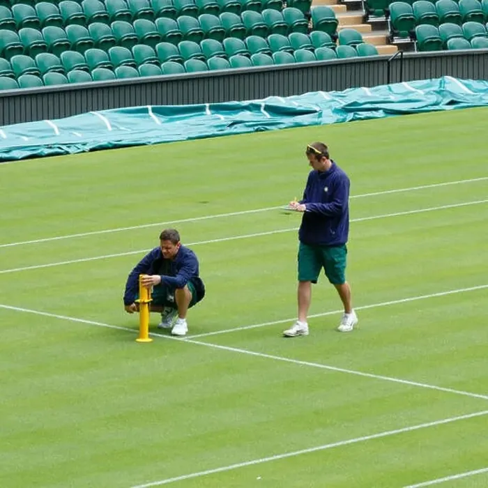 Framed Print : London, UK. 14th June 2013. Groundsmen check the level of the grass on Centre Court at the All England Club Framed Print : London, UK. 14th June 2013. Groundsmen check the level of the grass on Centre Court at the All England Club