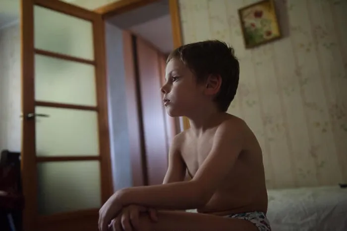 Framed Print : lonely little boy sitting in the room with no clothes on Framed Print : lonely little boy sitting in the room with no clothes on