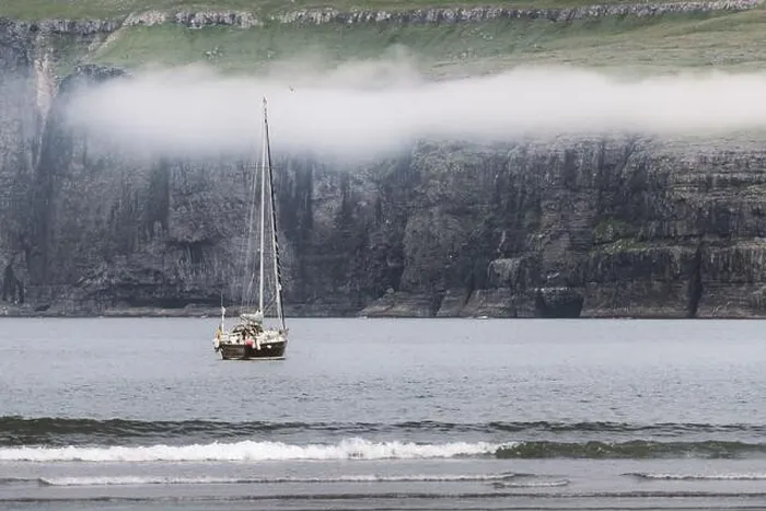 Framed Print : Lonely yacht near Tjornuvik coast on Streymoy Island, Faroe Islands. Landscape photography Framed Print : Lonely yacht near Tjornuvik coast on Streymoy Island, Faroe Islands. Landscape photography